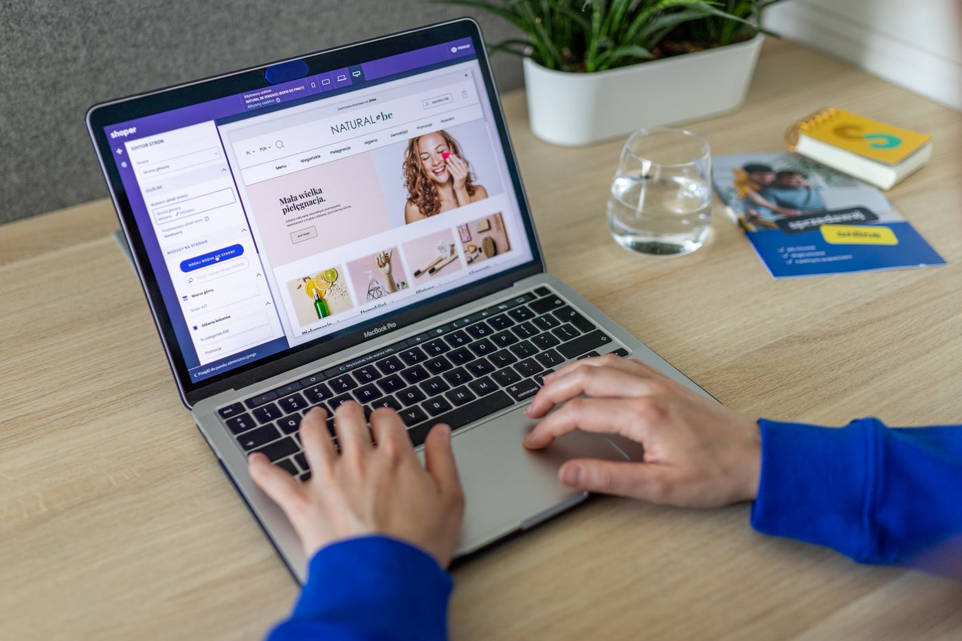 An ecommerce storefront being edited on a laptop