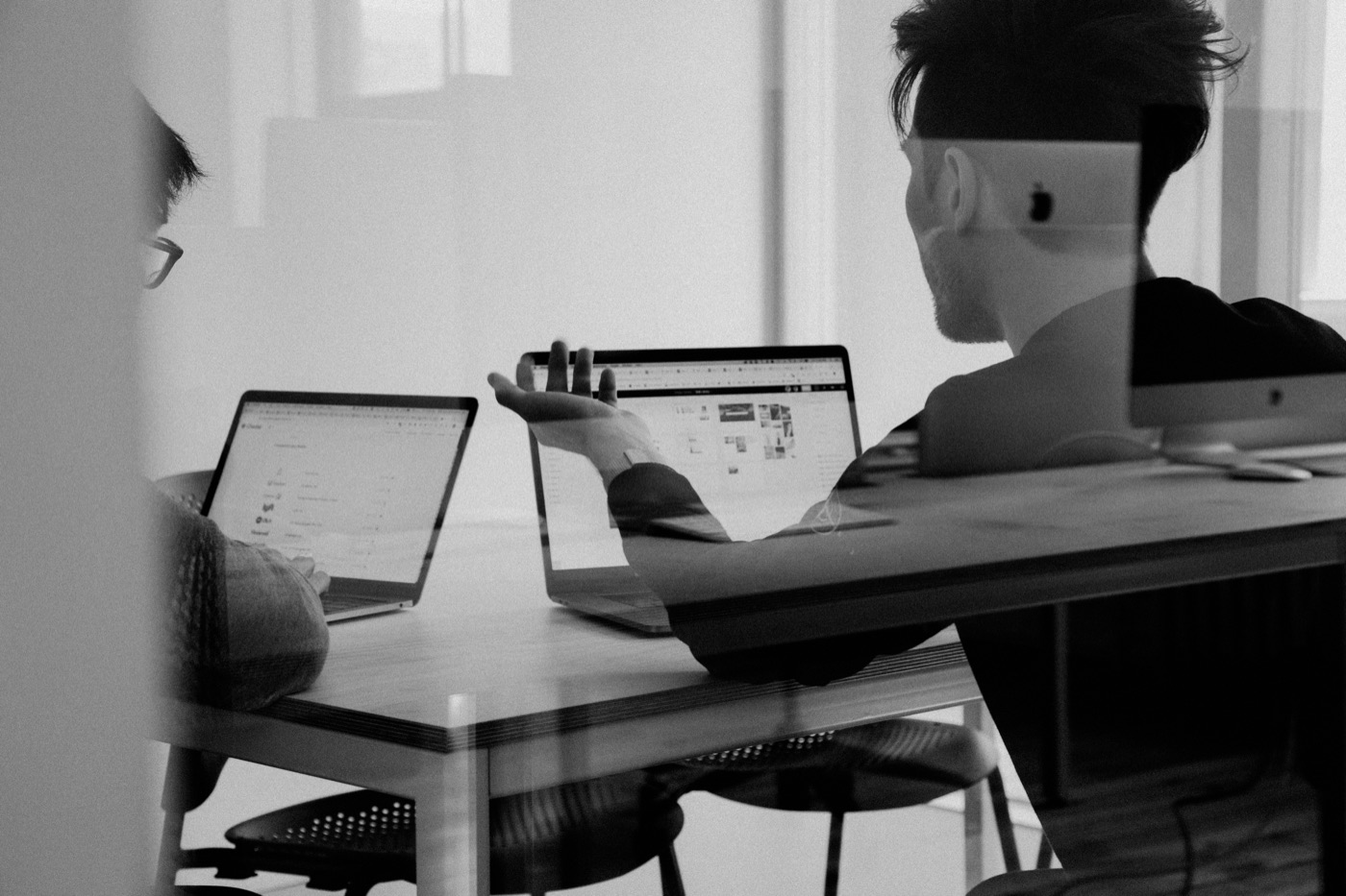 Reviewing Microsoft Ads search campaigns on a laptop