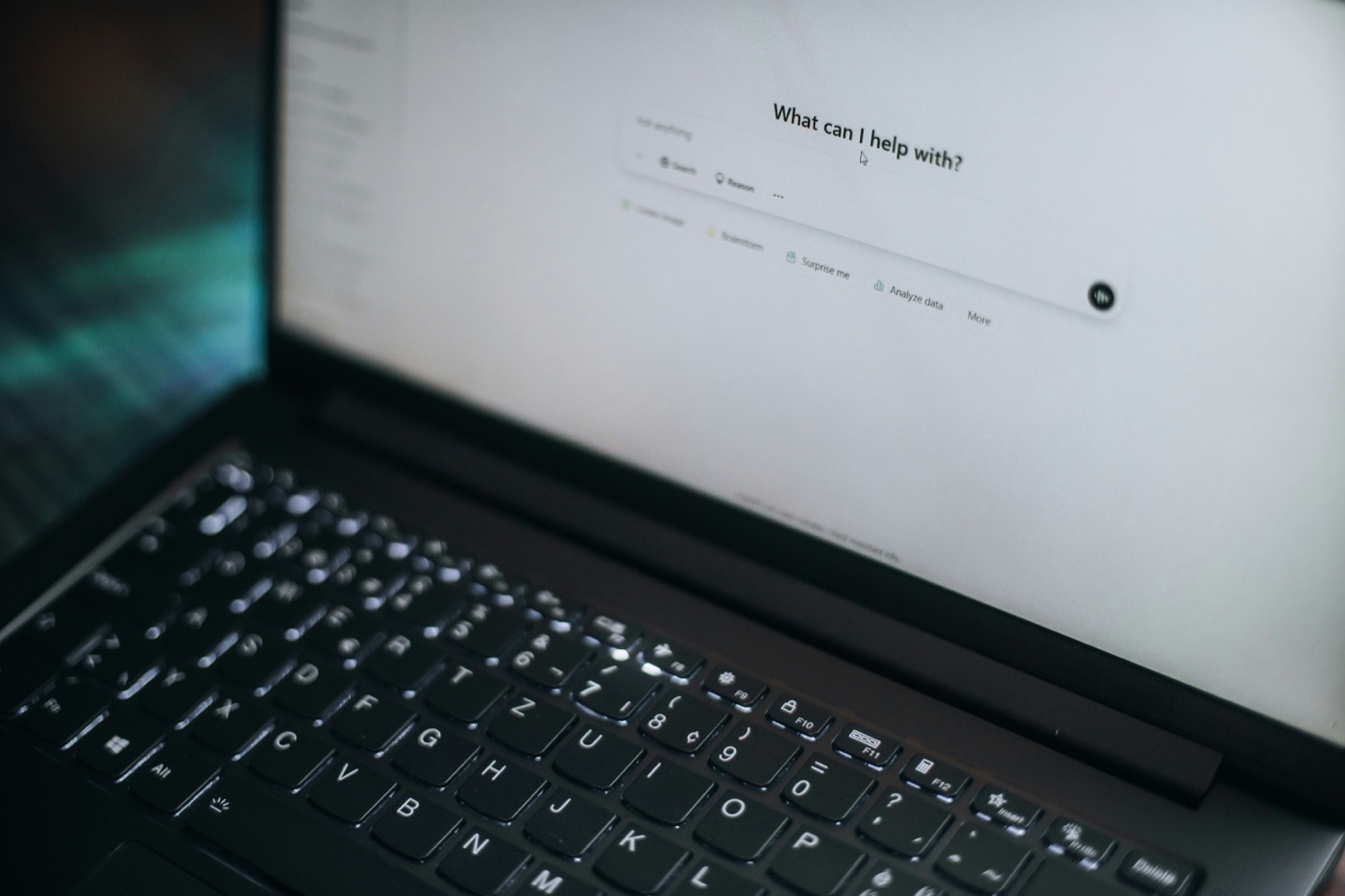 An AI chat prompt screen open on a laptop